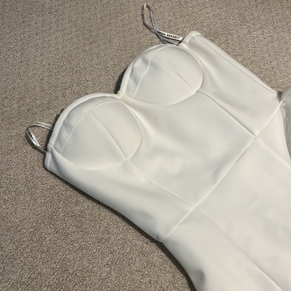 Never worn new with tags. Amazing quality, no blemishes very flattering. - Picture 2 of 3